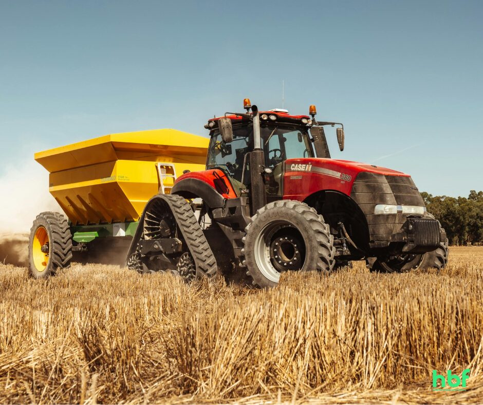 A tractor in a field show representing agricultural equipment